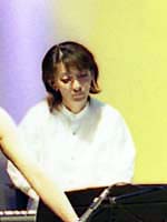 �~�J����